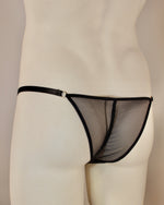 Load image into Gallery viewer, rear view of the Fishnet brief handmade lingerie for men by Moot. Pouched underwear to fit, sexy underwear for men, lingerie for men, erotic panties for him, Sexy lingerie, lingerie for men, mens lingerie, men’s lingerie, knickers for men, panties for men, mans panties, pantee for men, lacy knickers for men, mens sexy knickers, sissy knickers for men, sissy, panties, sex toys, adult toys, sexy hosiery for men, erotic sex toys, mens sex panties, pride, hot gay thong, gay guys, hot gay guys, pride pantie
