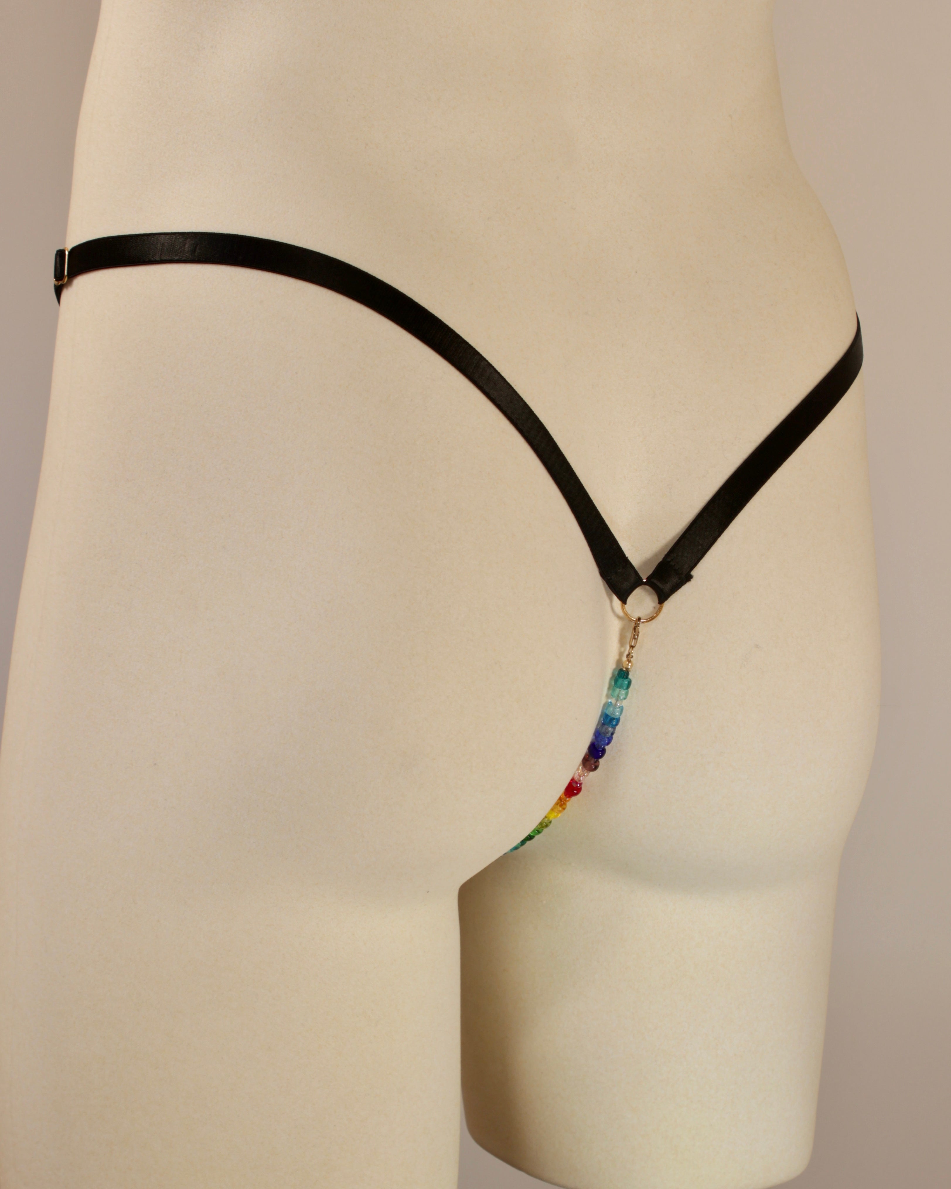 rear view of satin straps on open lasso thong by Moot lingerie for men. Mens thong, open sexy underwear, rainbow bead thong, beaded thong, sensual underwear for men, 
