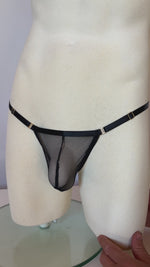 Load and play video in Gallery viewer, Jules describes the fishnet brief by Moot Lingerie for men 
