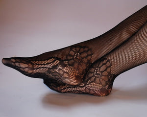 mans feet in sexy nylon fishnet tights lacy floral nylons with feet close up of feet in sexy tights mens lingerie by Moot Lingerie