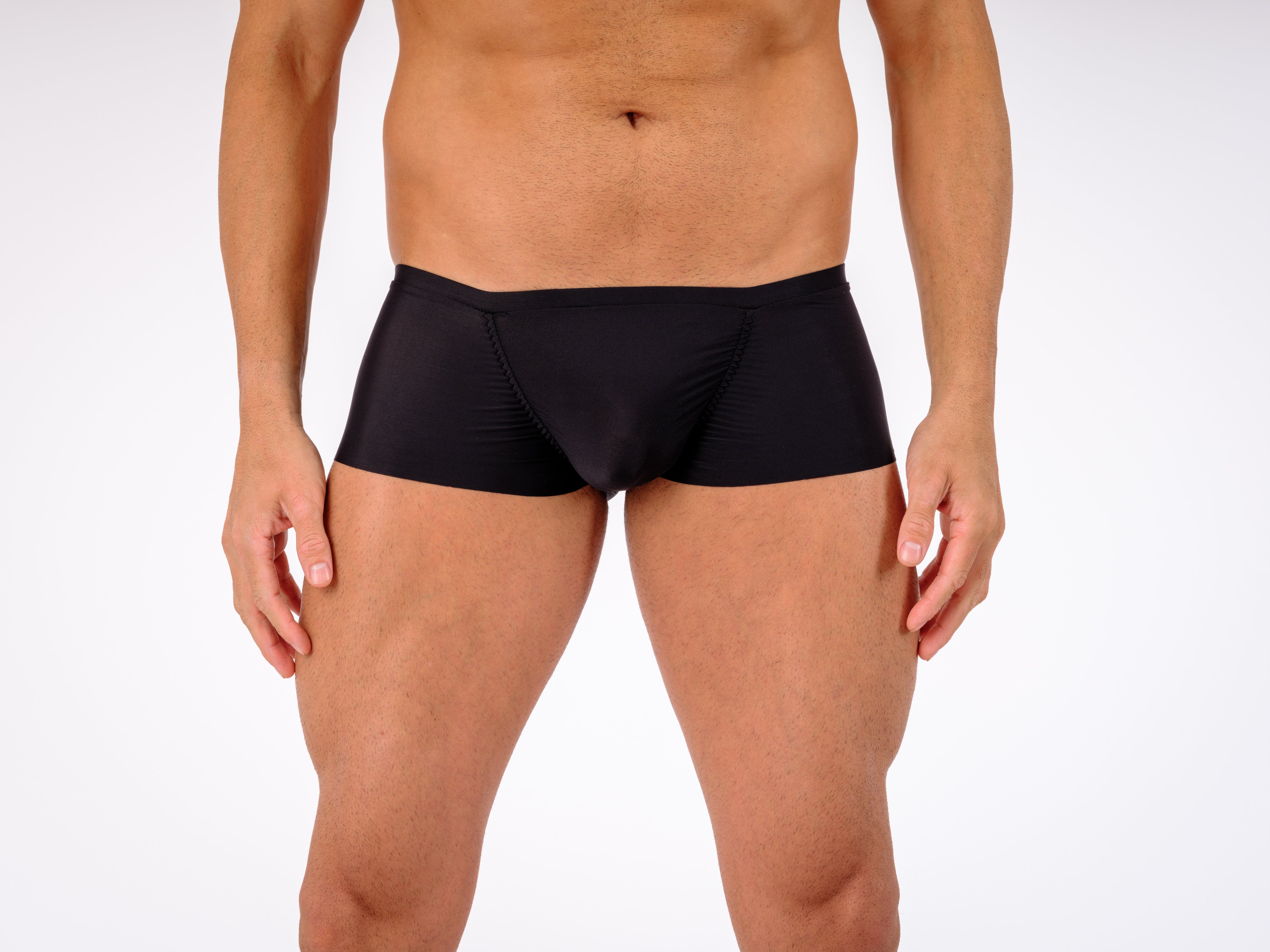 male torso wearing tight black sexy boxer shorts by Moot Lingerie